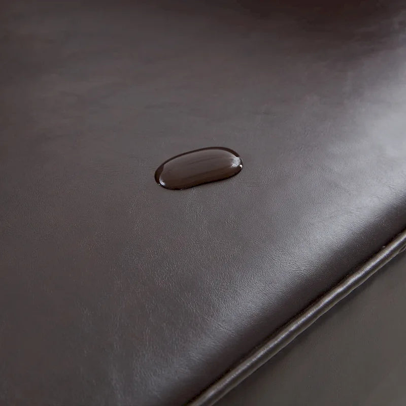 Sillón tapizado decorativo con capitoné de botones