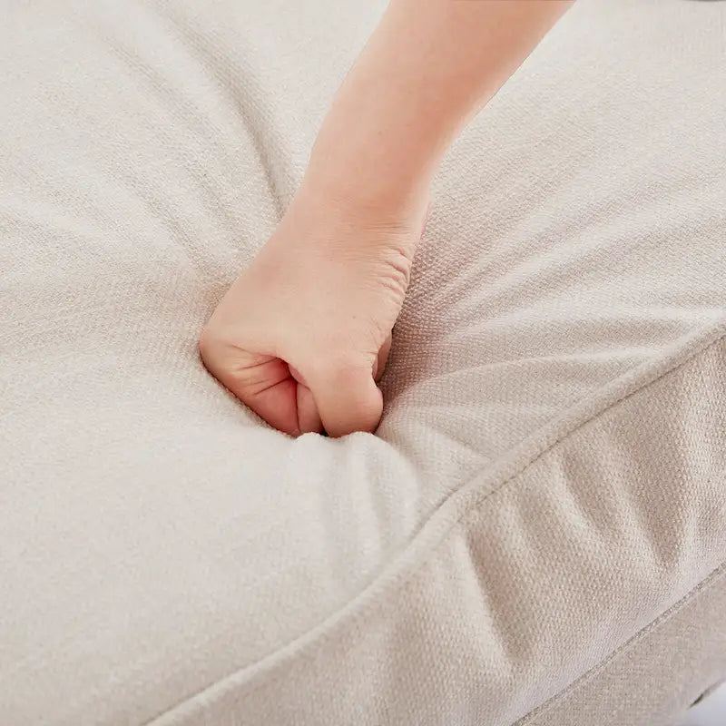 Sillón tapizado decorativo con capitoné de botones