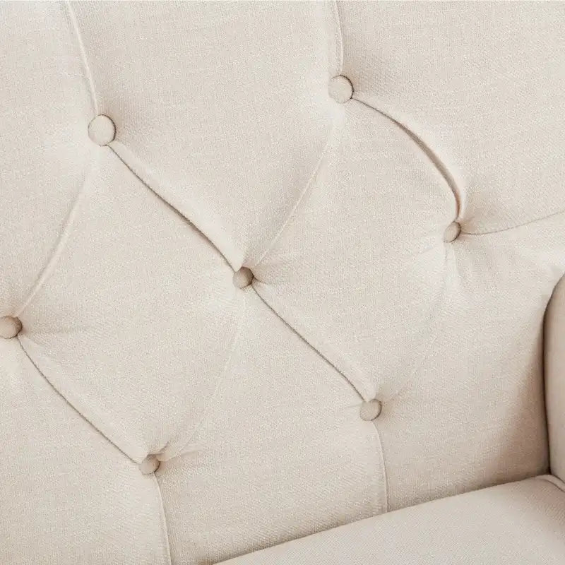 Sillón tapizado decorativo con capitoné de botones