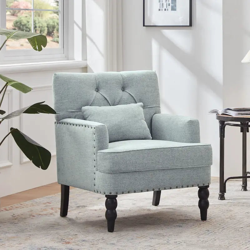 Sillón tapizado decorativo con capitoné de botones