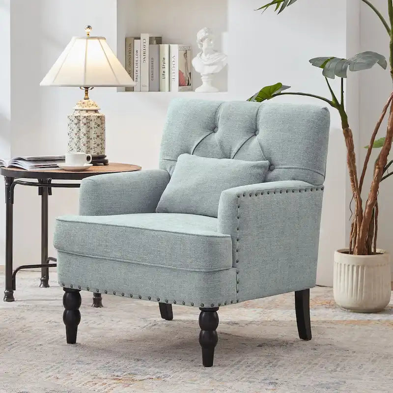Sillón tapizado decorativo con capitoné de botones